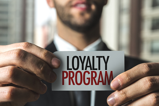 paper with loyalty program written on it